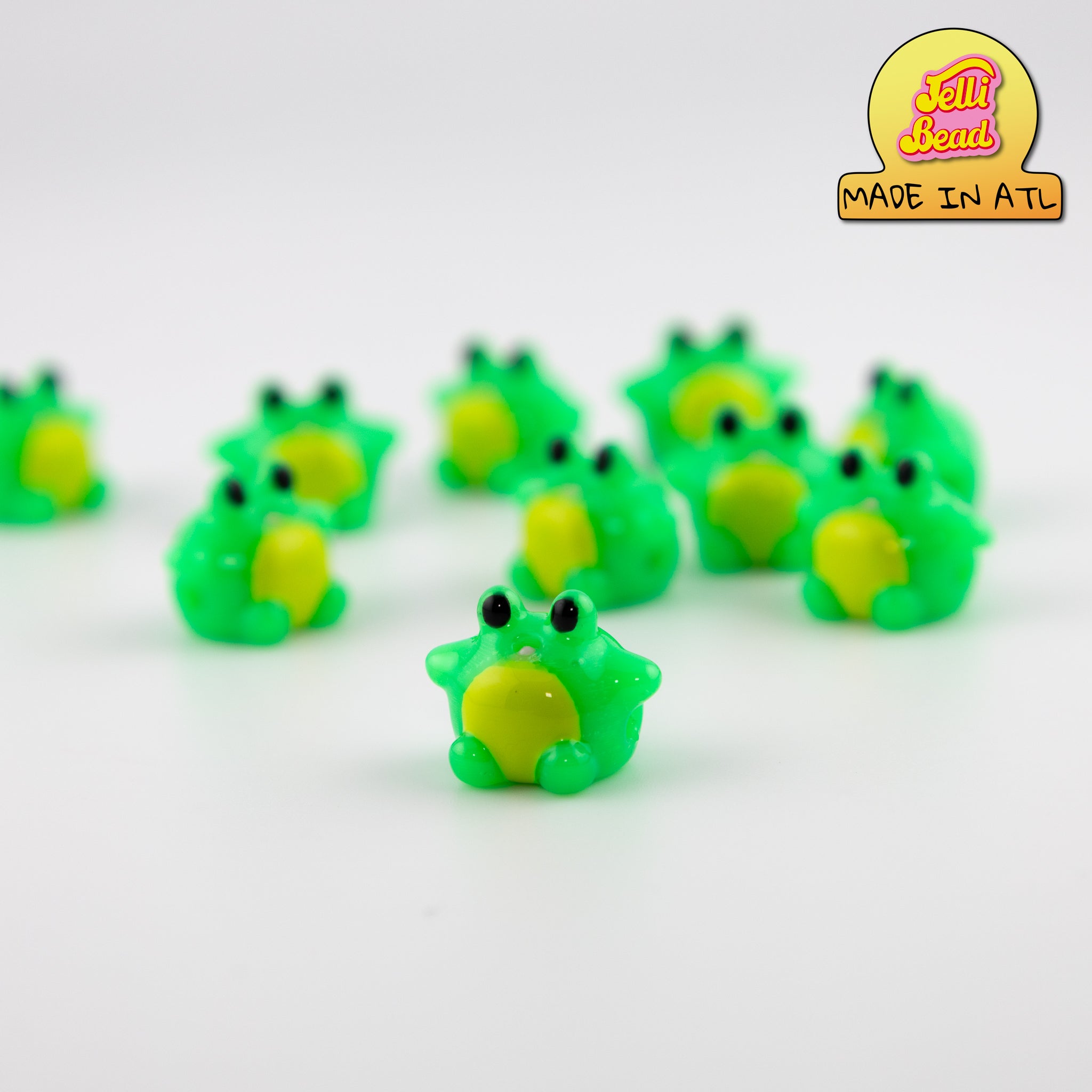 Green Frog Beads   1  - Jelli Bead, Colorful custom kandi beads for beaded bracelets, perfect for music festivals, swifties, and rave fashion. Personalized charm bracelets that add flair to any look.