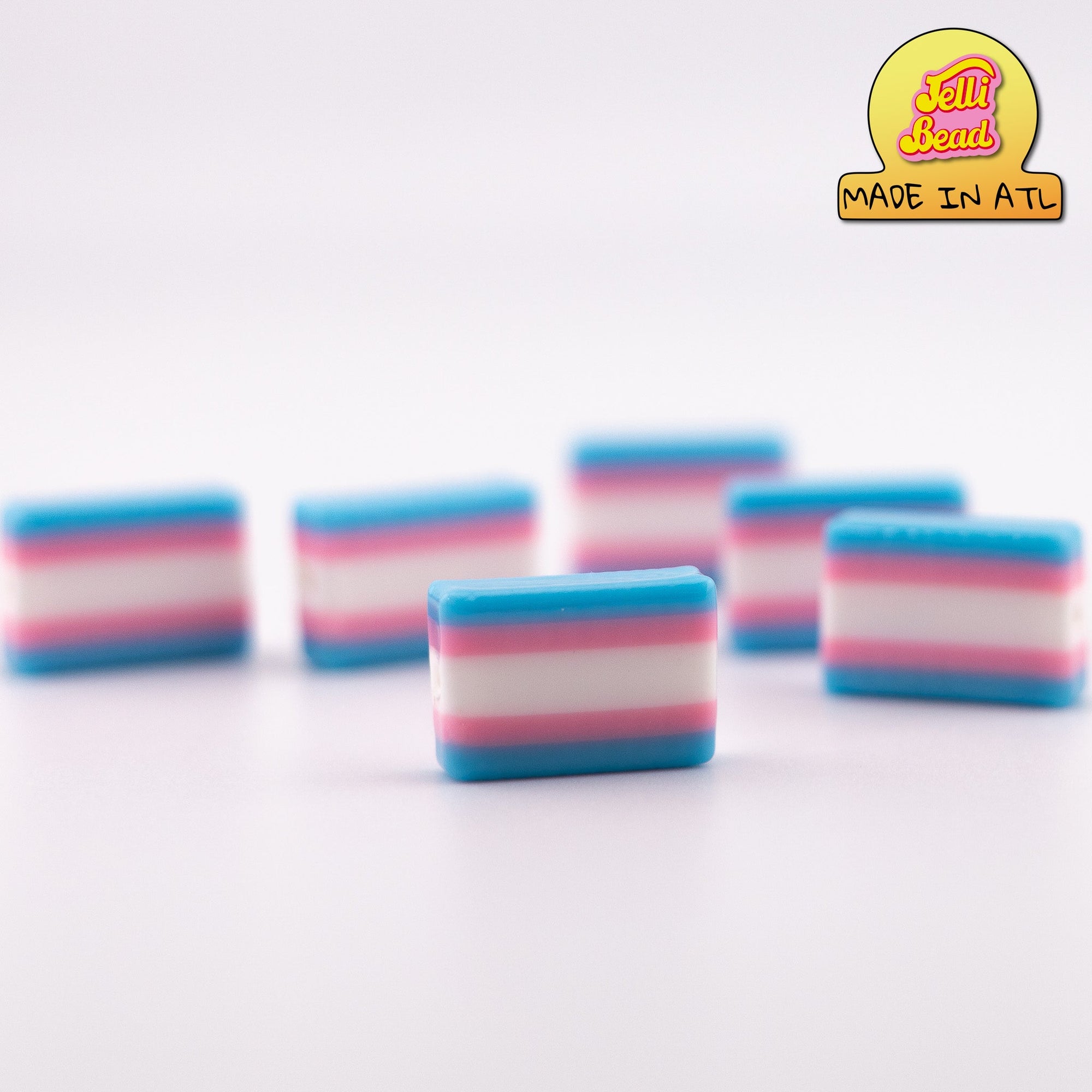 Trans Flag Beads   1  - Jelli Bead, Colorful custom kandi beads for beaded bracelets, perfect for music festivals, swifties, and rave fashion. Personalized charm bracelets that add flair to any look.